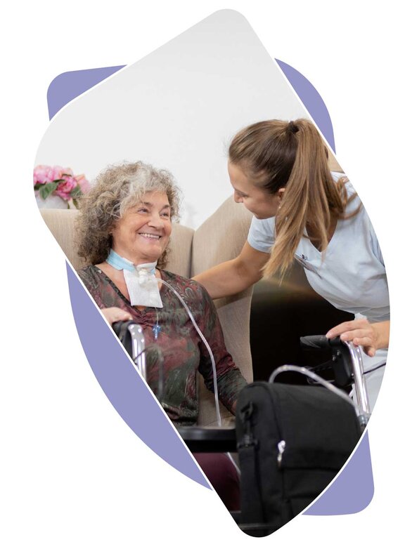 Pflegerin mit Patientin